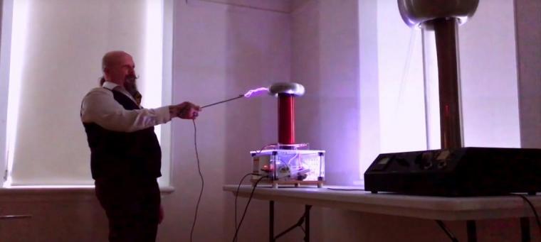 Orbax demonstrating an electricity experiment