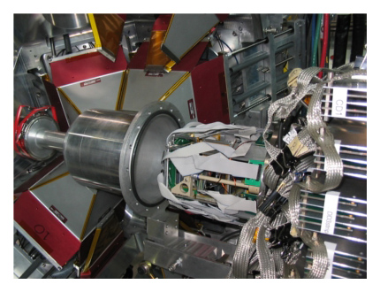  The SHARC Double-Sided Silicon Strip (DSSD) detector array being installed in a specialized target chamber at the centre of TIGRESS.